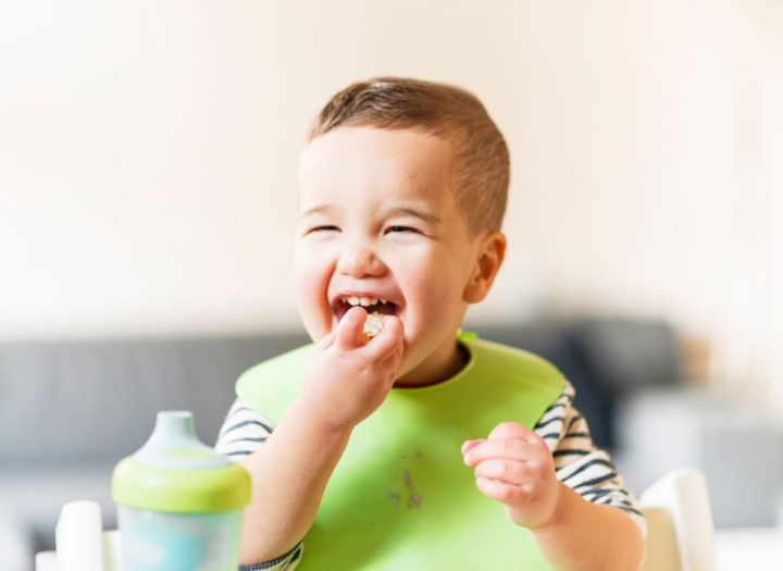 happy toddler at mealtime