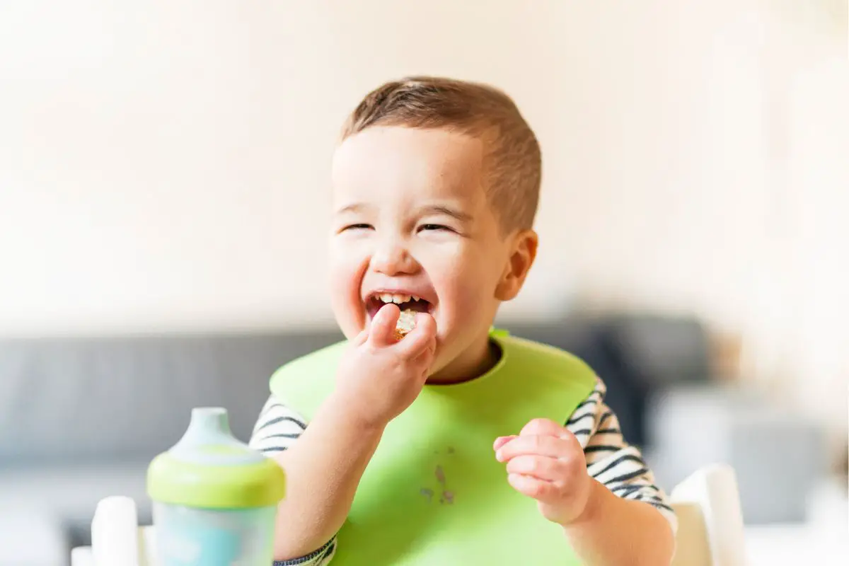 happy toddler at mealtime